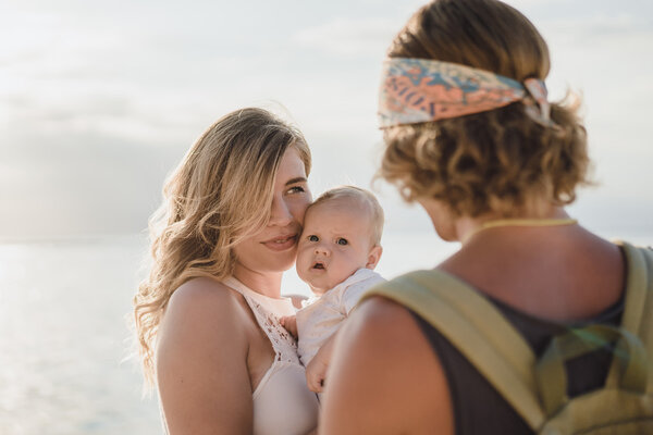 beautiful young couple in love with a child