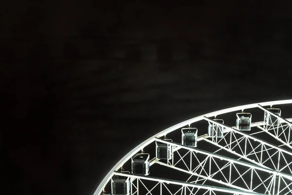 Ferris wheel in Miami at night.