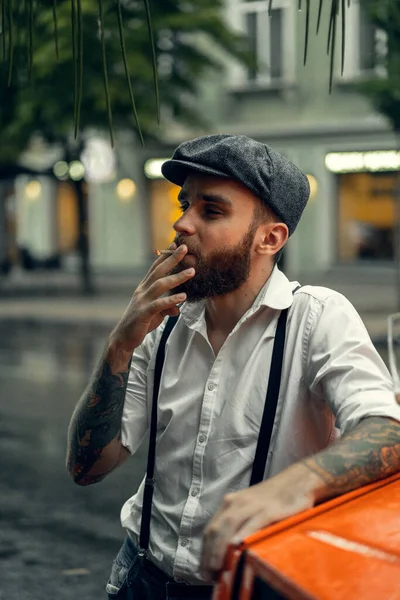 Young Bearded Tattoord Man Cafe Street Smokes Cigarette Romantic Guy — Stock Photo, Image