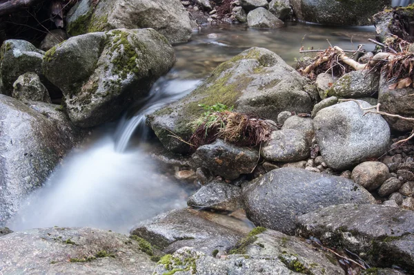 Flowing river between rocks — Stock Photo, Image