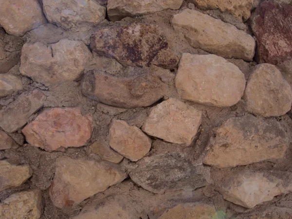 Vallende stenen in muur — Stockfoto