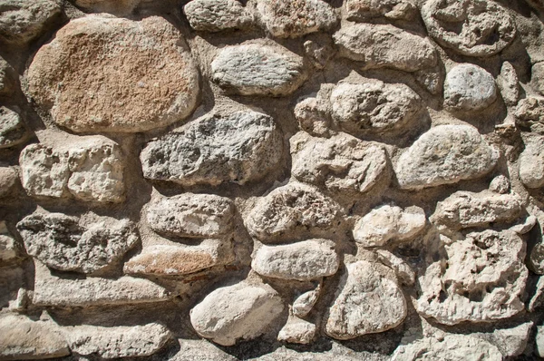 Muur van bruine rotsen — Stockfoto