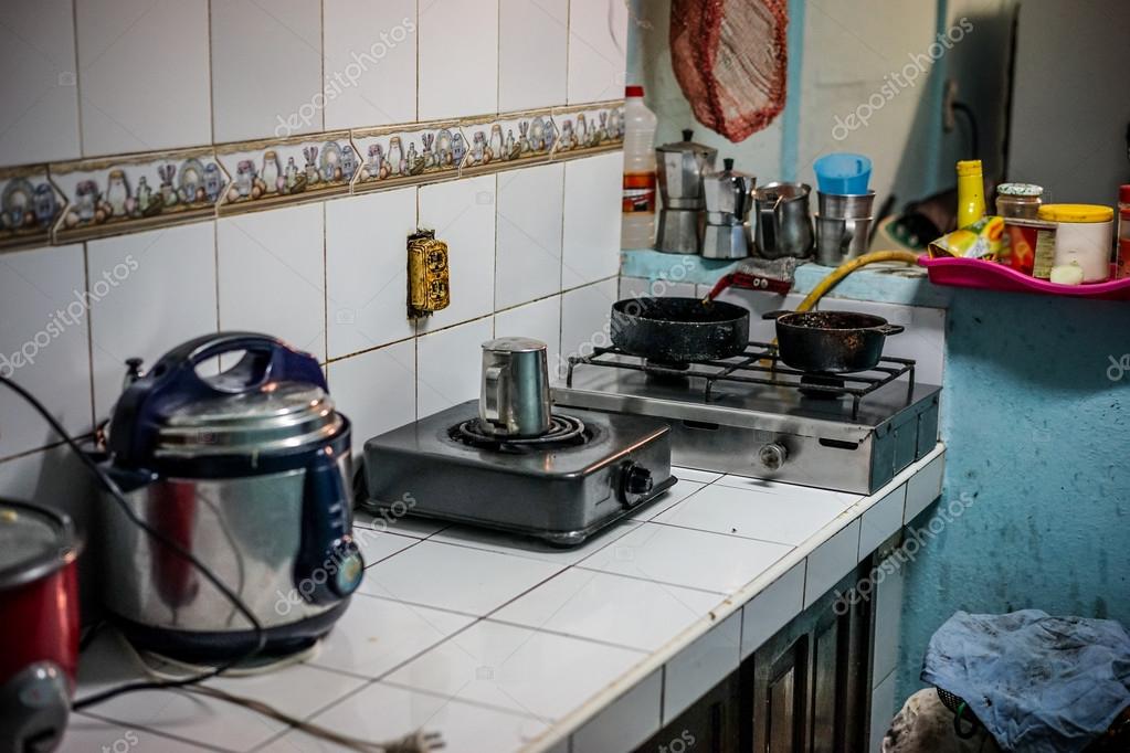 depositphotos_101107336-stock-photo-poor-housing-kitchen.jpg