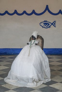 Santeria bebek, Afro Karayip din giyinmiş