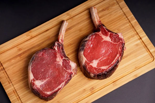 Tomahawk Steak on wood board — Stock Photo, Image