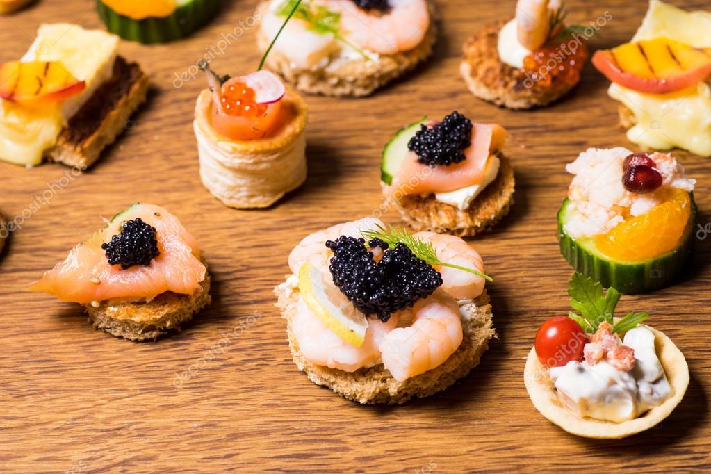 Exquisite selection of luxury appetizer Stock Photo by ©Esbenklinker
