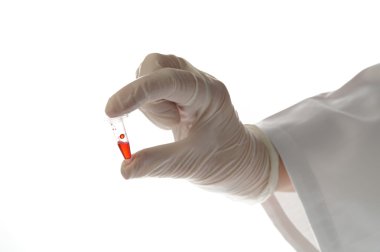 el ile üzerine beyaz izole testtube
