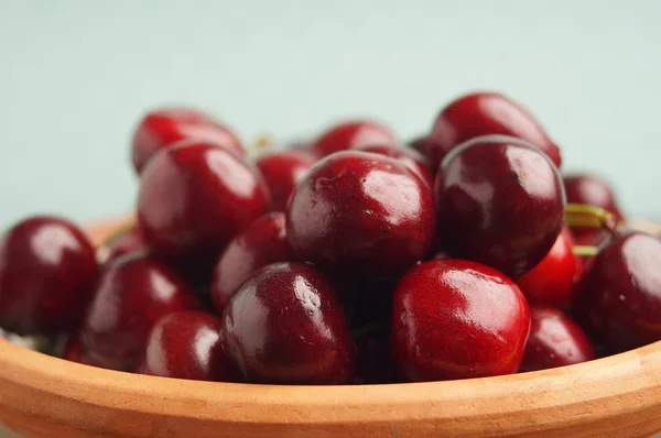 Cherries in a ceramic bowl — Stock Photo, Image