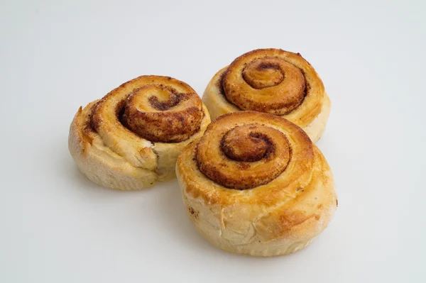 Tasty cinnamon buns ready — Stock Photo, Image