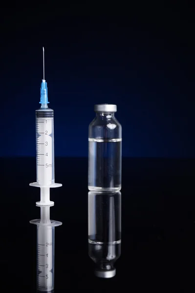 Syringe and vial — Stock Photo, Image