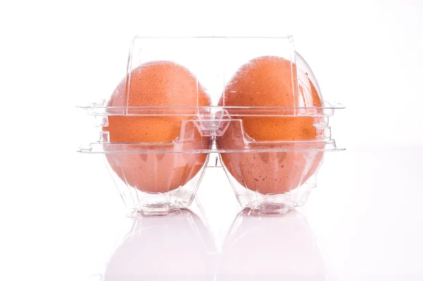 Egg tray with four egg — Stock Photo, Image