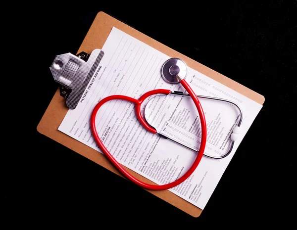 Tableau médical et stéthoscope — Photo