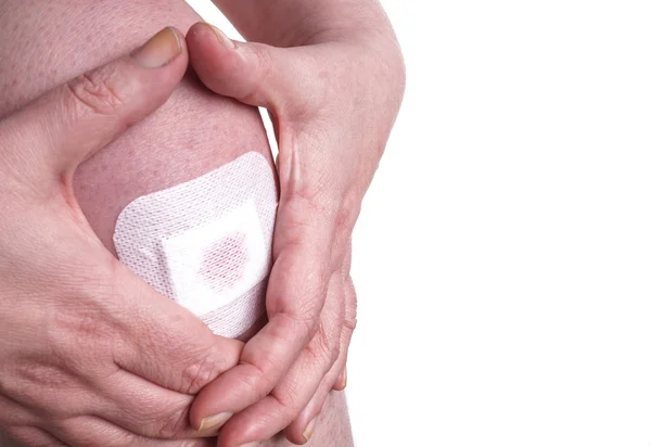 Plaster on a Womans Knee — Stock Photo, Image