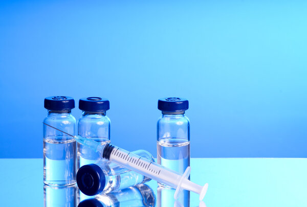 Medicine in vials and syringe