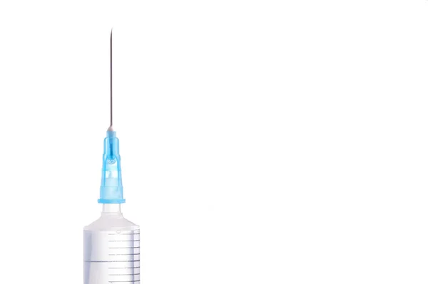 Syringe and needle filled with liquid — Stock Photo, Image