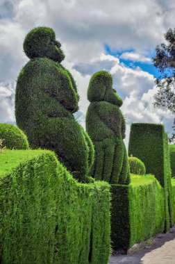 Tulcan Is Known For The Most Elaborate Topiary Cemetery clipart