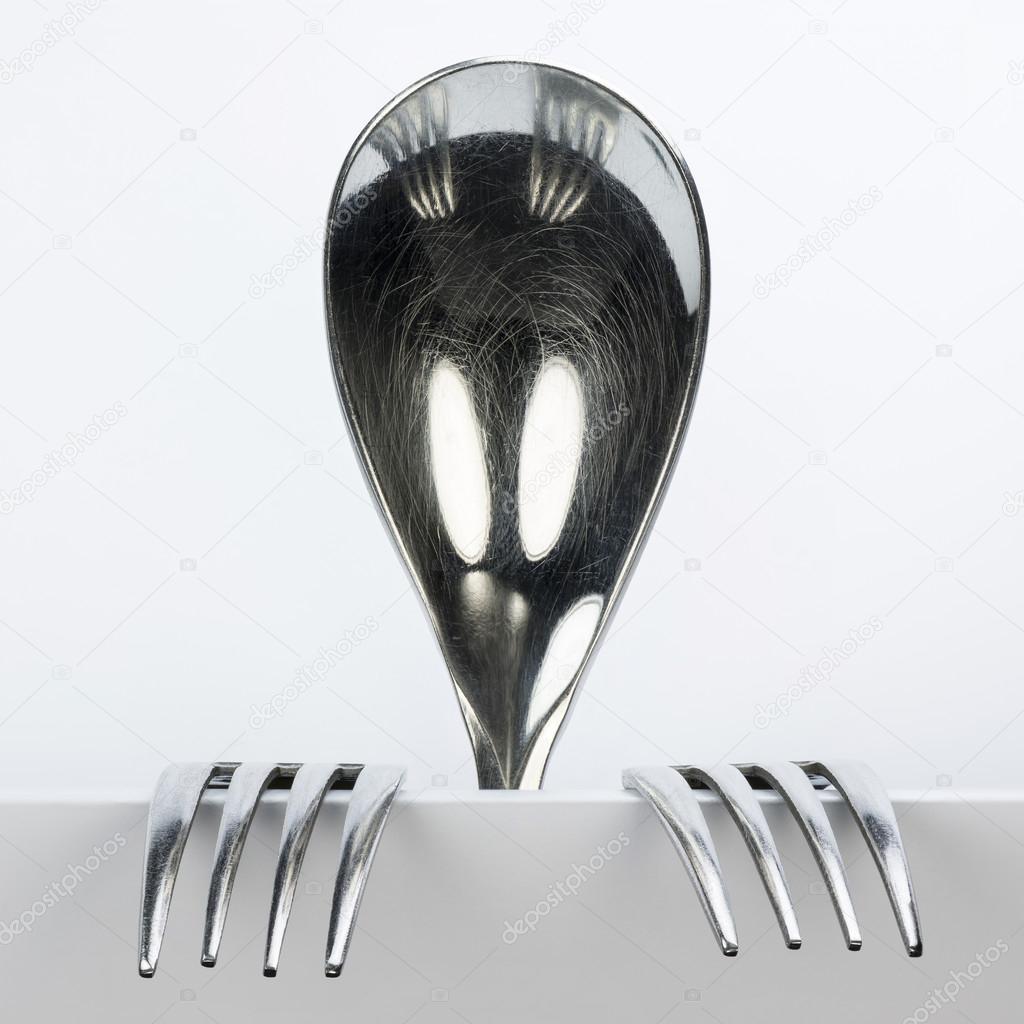 Figure of spoon and two forks