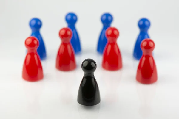 Conceptual game pawns — Stock Photo, Image