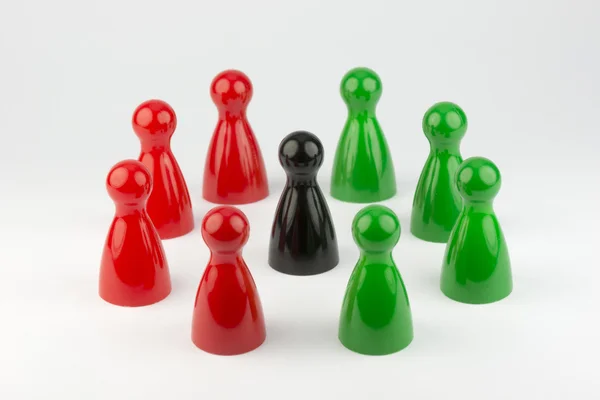 Conceptual game pawns — Stock Photo, Image