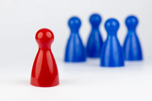 Conceptual game pawns — Stock Photo, Image