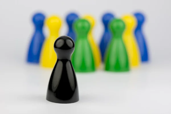 Conceptual game pawns — Stock Photo, Image