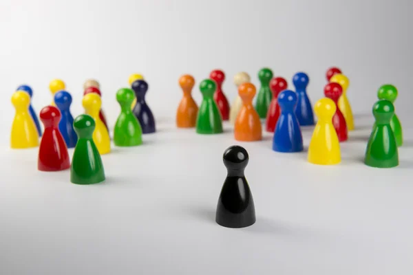 Conceptual game pawns — Stock Photo, Image