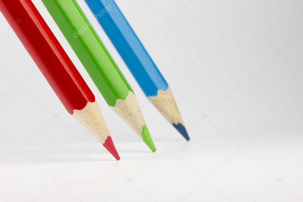 Three colored pencils in RGB color