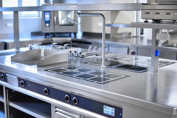 A stainless steel kitchen in a restaurant