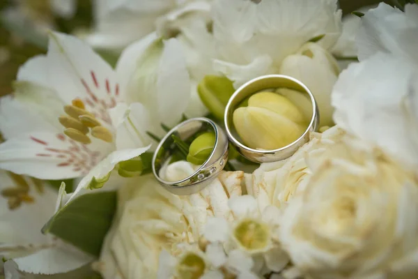 Wedding Rings Bouquet White Flowers Stock Photo