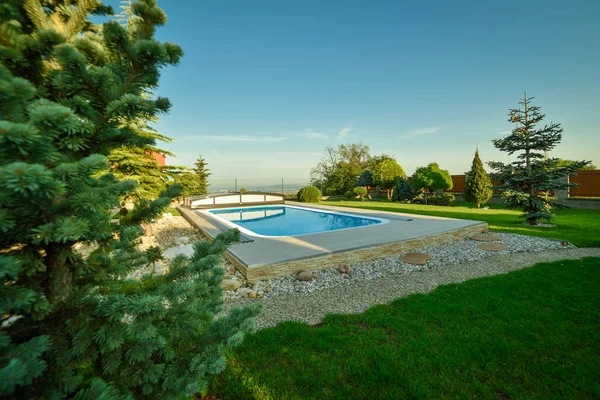 Polycarbonate Swimming Pool Cover in the garden