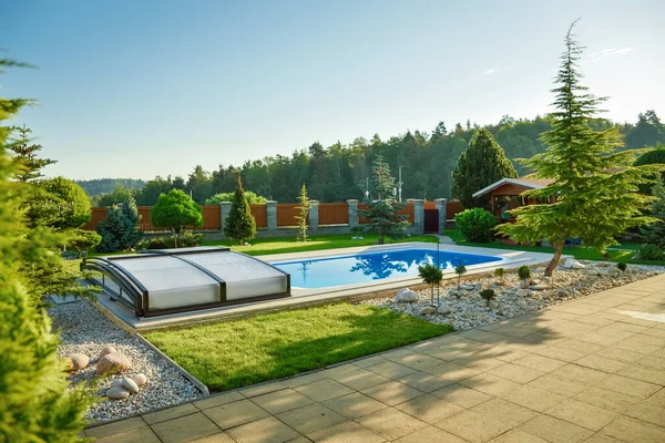 Polycarbonate Swimming Pool Cover in the garden