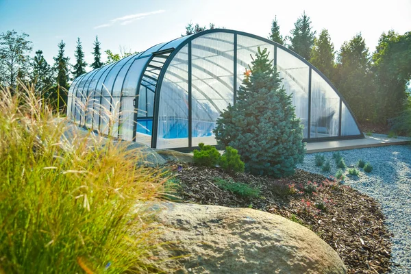 Polycarbonate Swimming Pool Cover in the garden