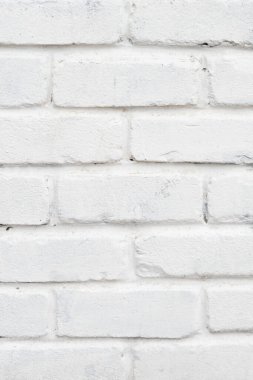 Soyut beyaz tuğla duvar desenli arka plan, dikey yönelim, yakın plan