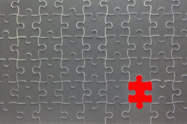 Parlak kırmızı parçalı gri yapboz