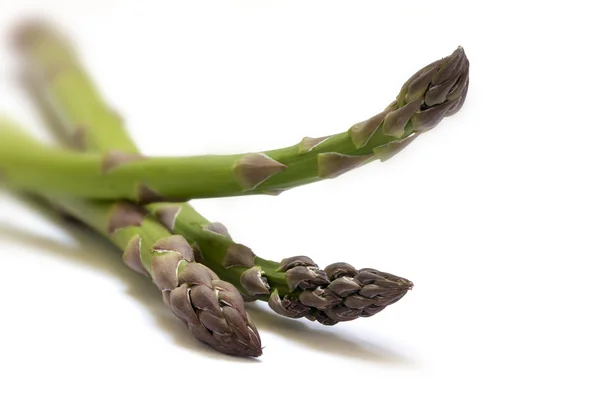 Green asparagus, three spears  isolated on  white, closeup with — Stock Photo, Image