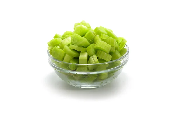 Fresh rhubarb, sliced pieces in a glass bowl isolated on a white background — Stock Photo, Image