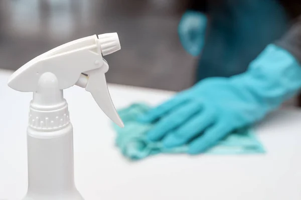 Bottle Disinfection Spray Foreground Blurry Person Blue Gloves Back Cleaning — Stock Photo, Image