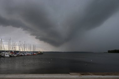 Storm clouds over the yacht harbor in the Salzhaff of Rerik at the Baltic Sea Mecklenburg-Vorpommern, Germany, copy space, selected focus