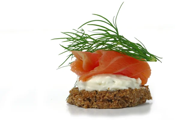 Canape with salmon and dill garnish, isolated on white backgrou — Stock Photo, Image
