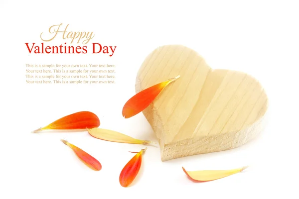Wooden heart shape with orange  petals, isolated, sample text Ha — Stock Photo, Image