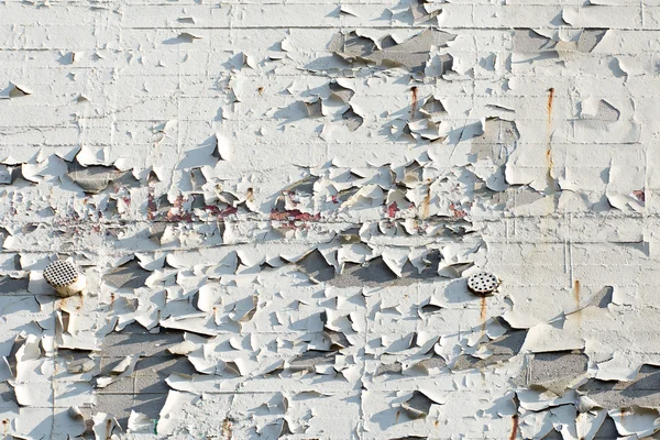 Facade with flacking white color, background texture — Stock Photo, Image