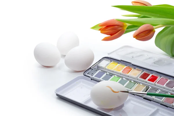 Painting Easter eggs with watercolor isolated on white, corner b — Stock Photo, Image