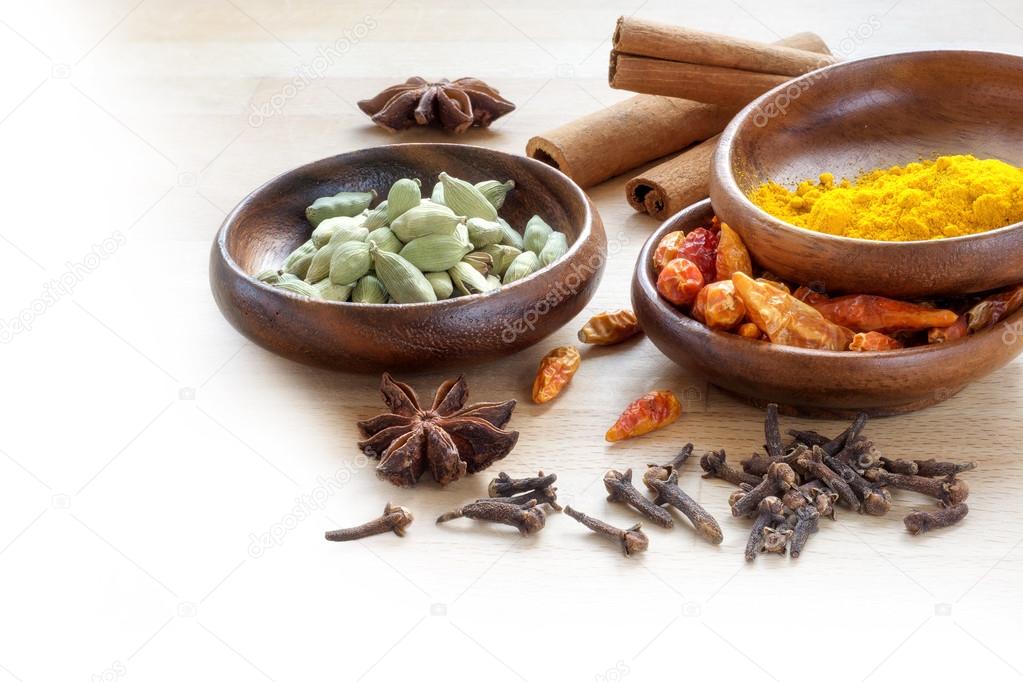 exotic spices, corner background for indian cooking blurred to w