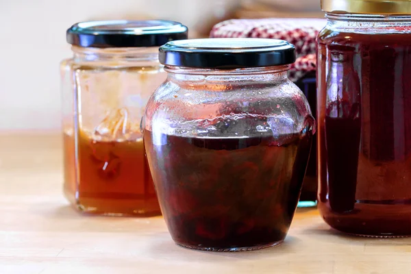 Jars with various homemade fruit jam — Stock Photo, Image