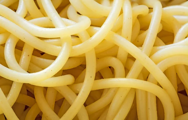 Macro shot of cooked spaghetti noodles — Stock Photo, Image