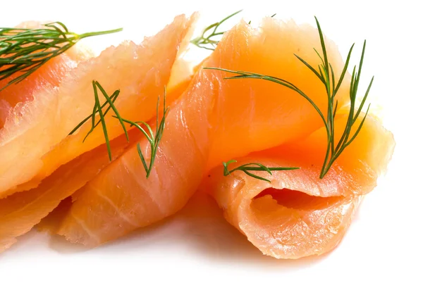 Smoked salmon in slices with dill garnish — Stock Photo, Image