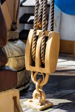 pulley with ropes on sailing vessel clipart