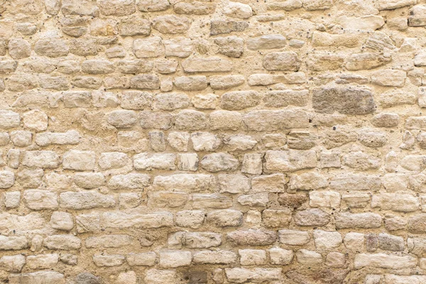 Textura de fundo, parede de pedra natural pálida — Fotografia de Stock