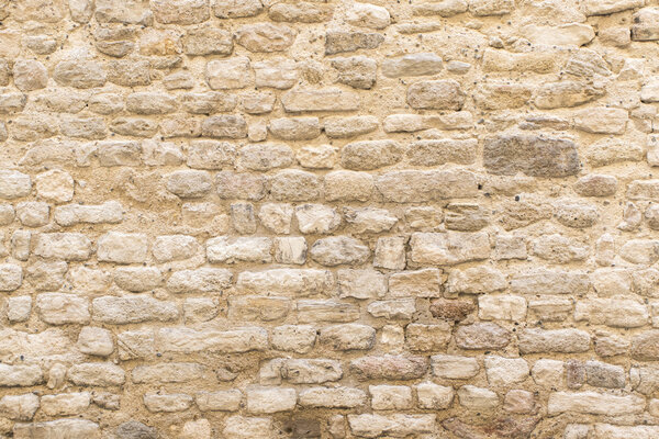 background texture, wall of pale natural stone 