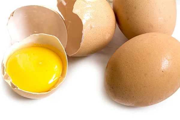 Eggs, broken shells and egg yolk — Stock Photo, Image